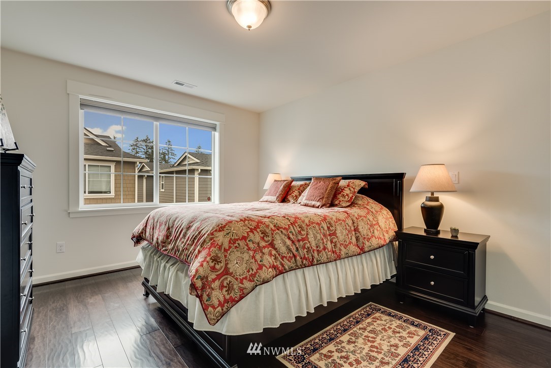4408 186th Street Southeast Bothell, WA 98012 - Photo 22 of 23 a bedroom with a bed and a window