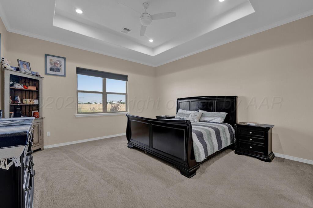 10855 Travis Lane Dumas, TX 79029 - Photo 17 of 40 pimary bedroom