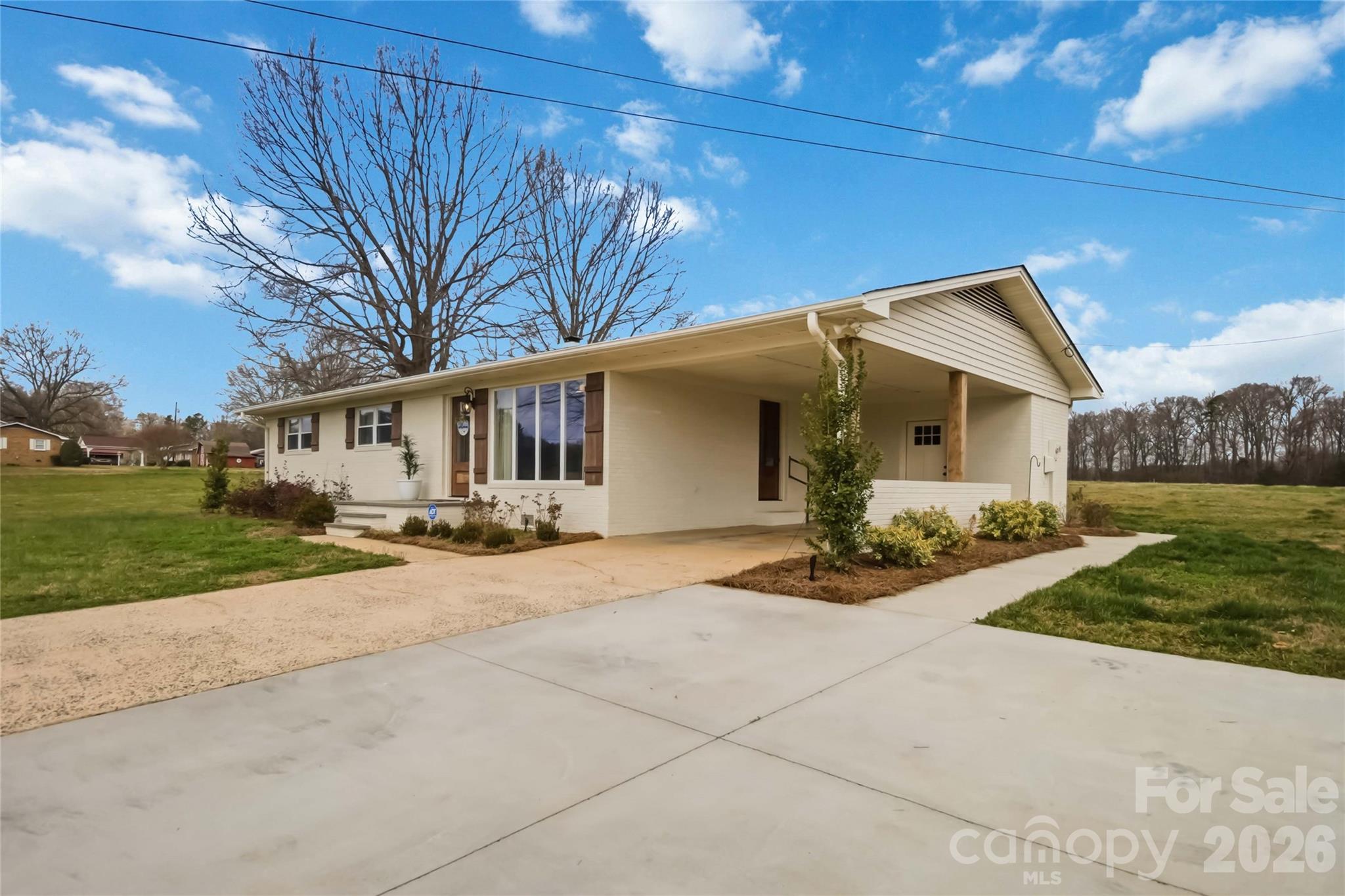 28461 Canton Road Albemarle, NC 28001 - Photo 1 of 30 a view of a house with a patio
