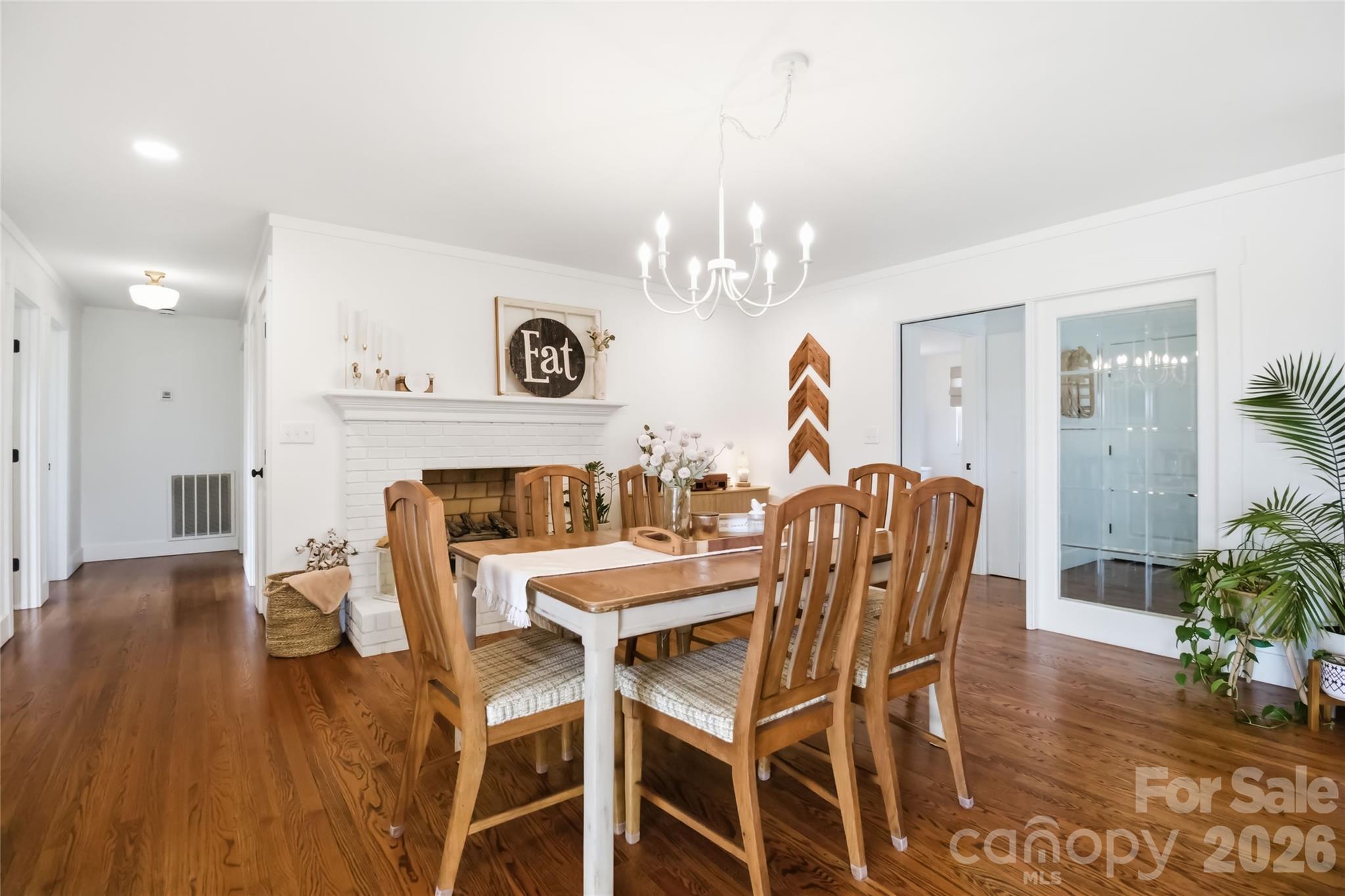 28461 Canton Road Albemarle, NC 28001 - Photo 13 of 30 a view of a dining room with furniture and wooden floor