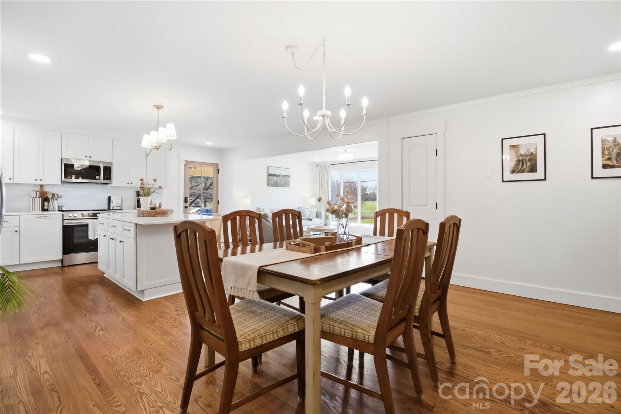 28461 Canton Road Albemarle, NC 28001 - Photo 15 of 30 a view of a dining room with furniture and chandelier