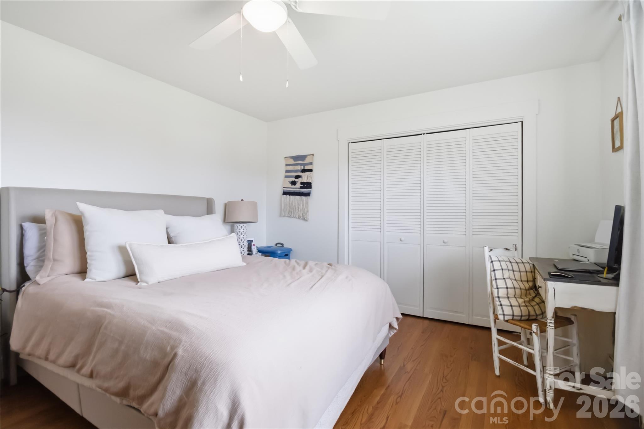28461 Canton Road Albemarle, NC 28001 - Photo 17 of 30 a bedroom with a bed a flat screen tv and dresser