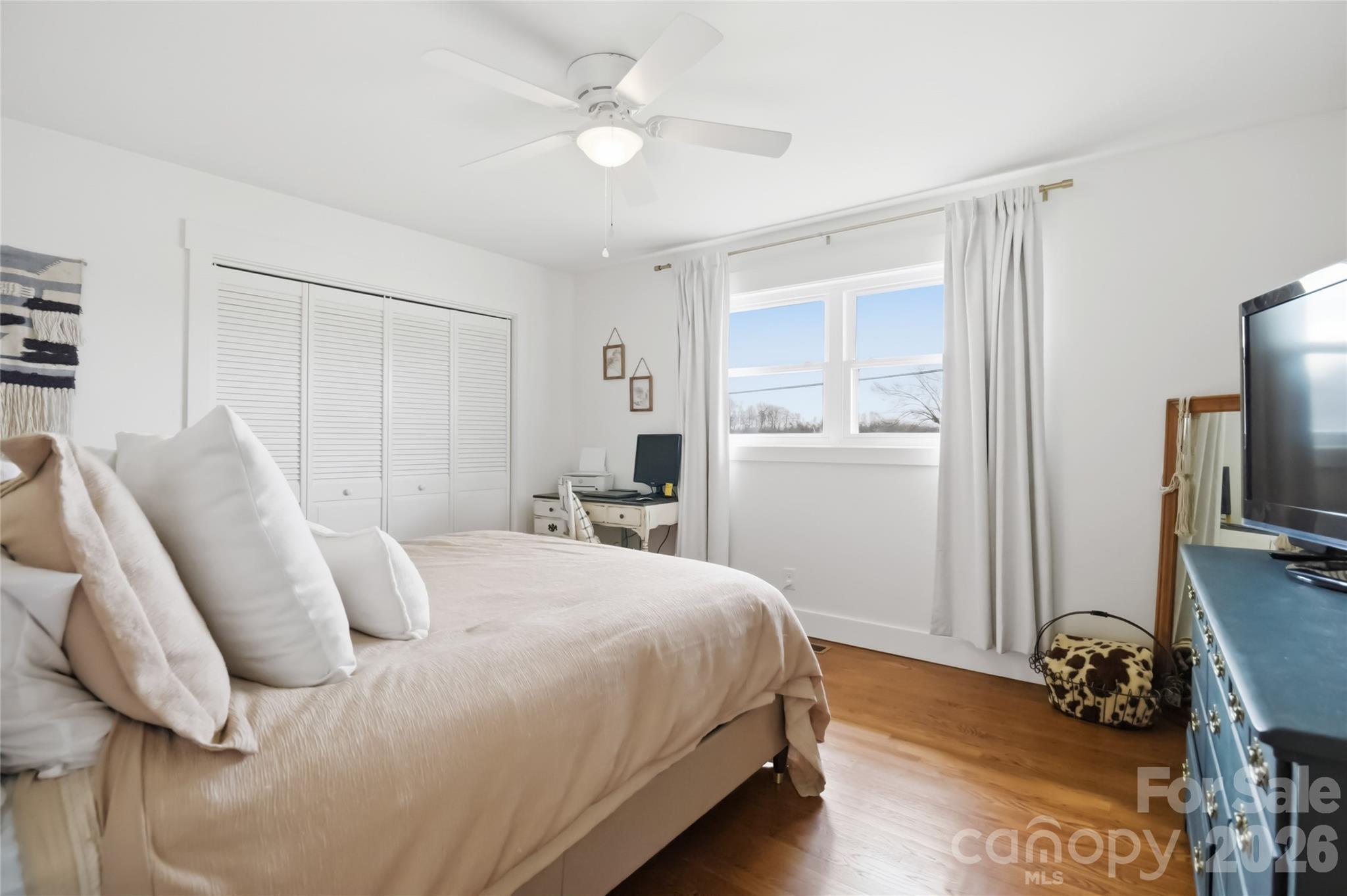 28461 Canton Road Albemarle, NC 28001 - Photo 18 of 30 a bedroom with a bed and a tv
