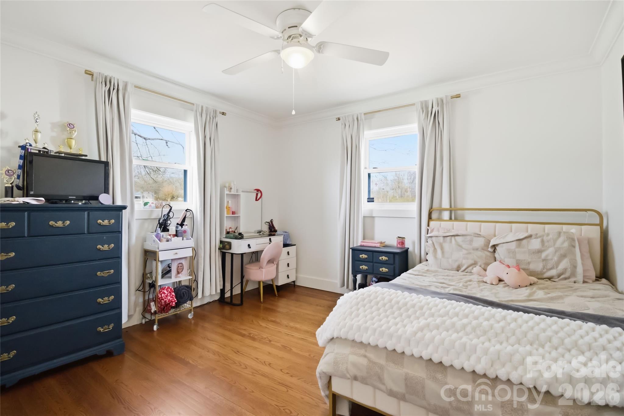 28461 Canton Road Albemarle, NC 28001 - Photo 20 of 30 a bedroom with a bed and wooden floor