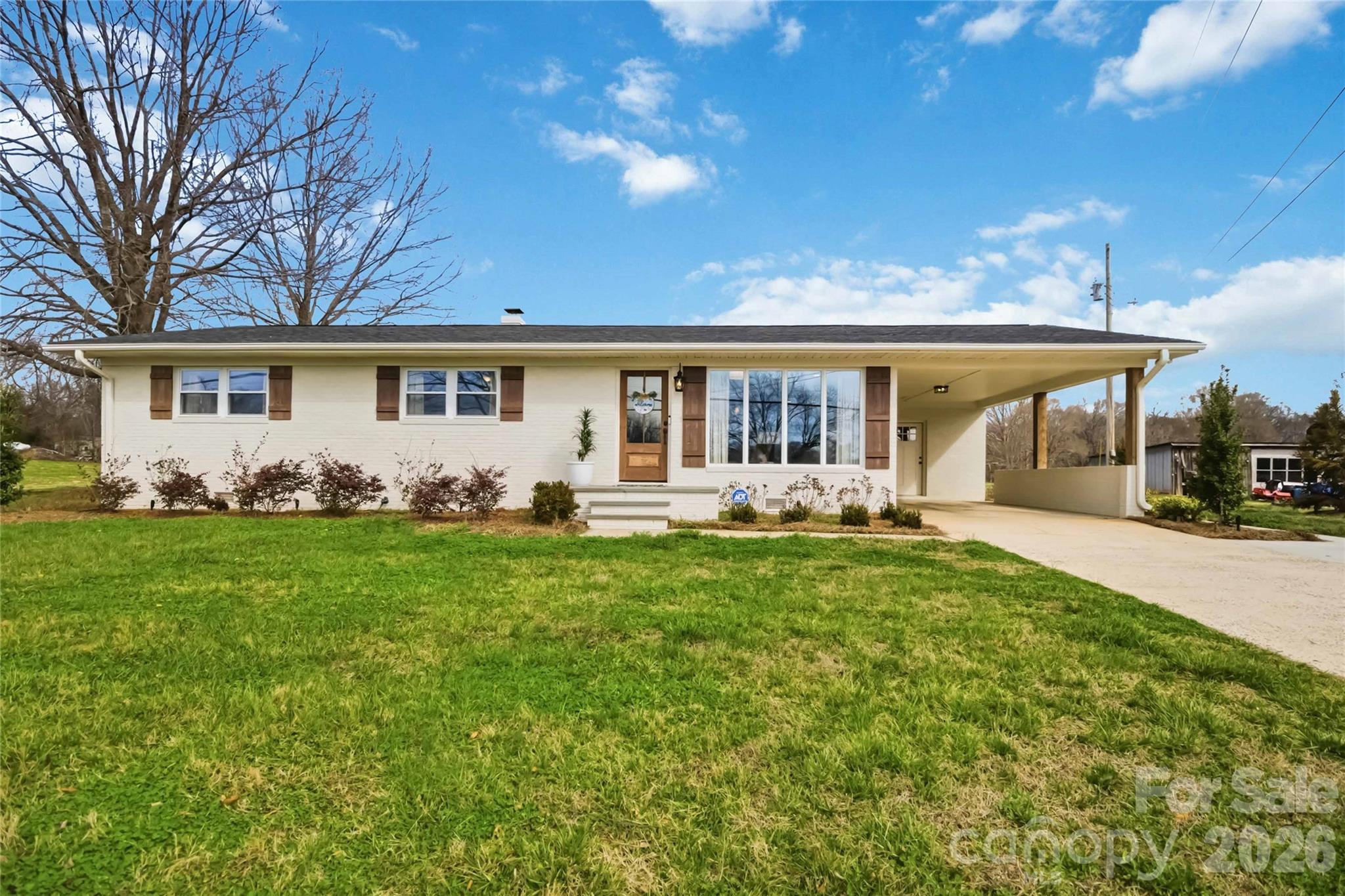 28461 Canton Road Albemarle, NC 28001 - Photo 2 of 30 a front view of house with yard and green space