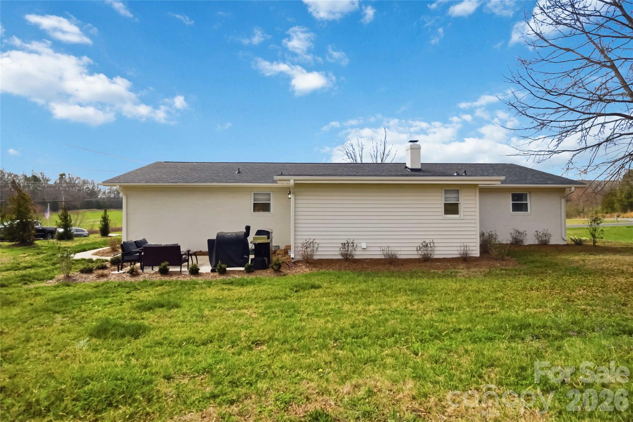 28461 Canton Road Albemarle, NC 28001 - Photo 29 of 30 a view of a house with a yard and sitting area