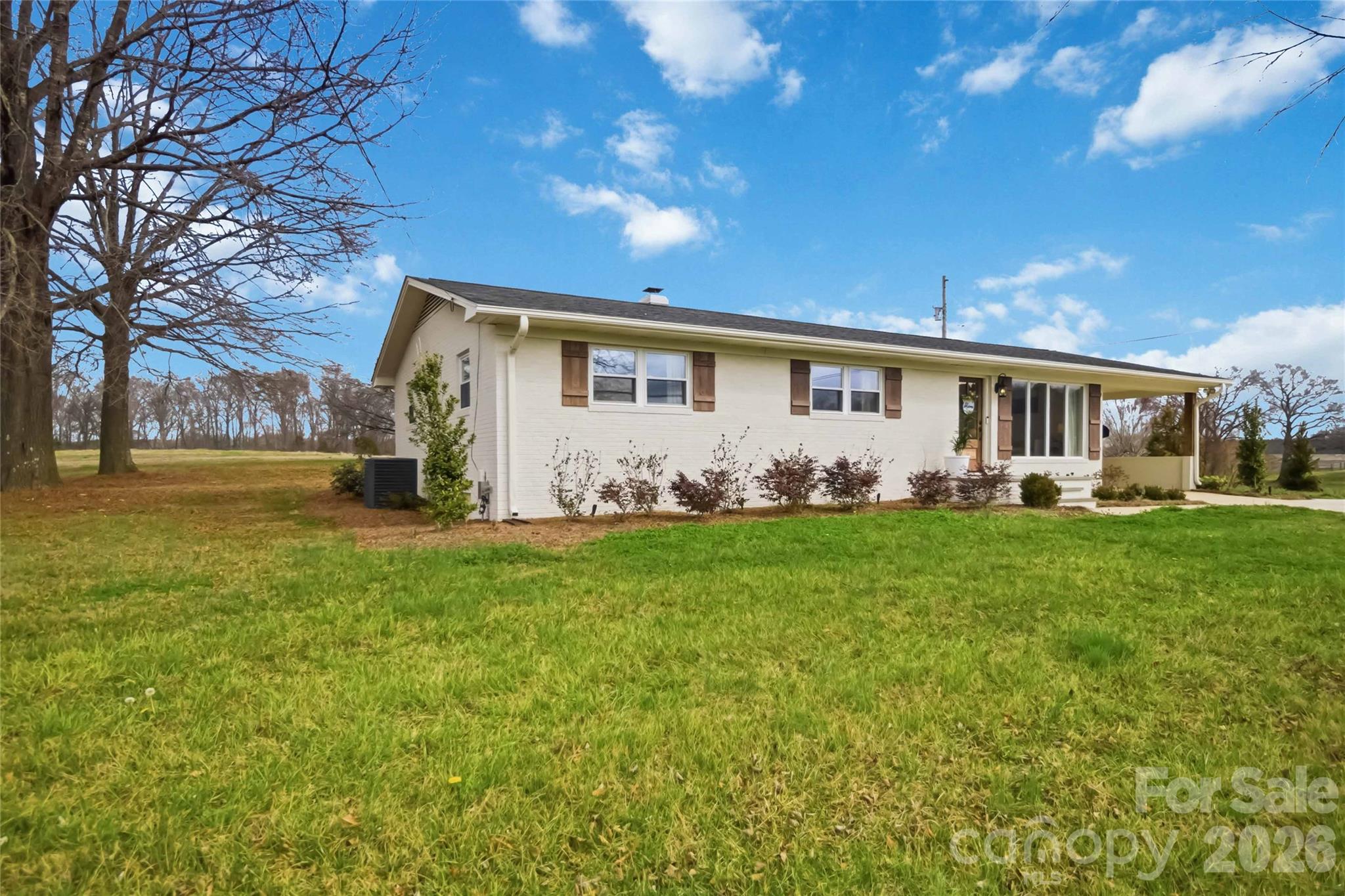 28461 Canton Road Albemarle, NC 28001 - Photo 3 of 30 a front view of house with yard and trees