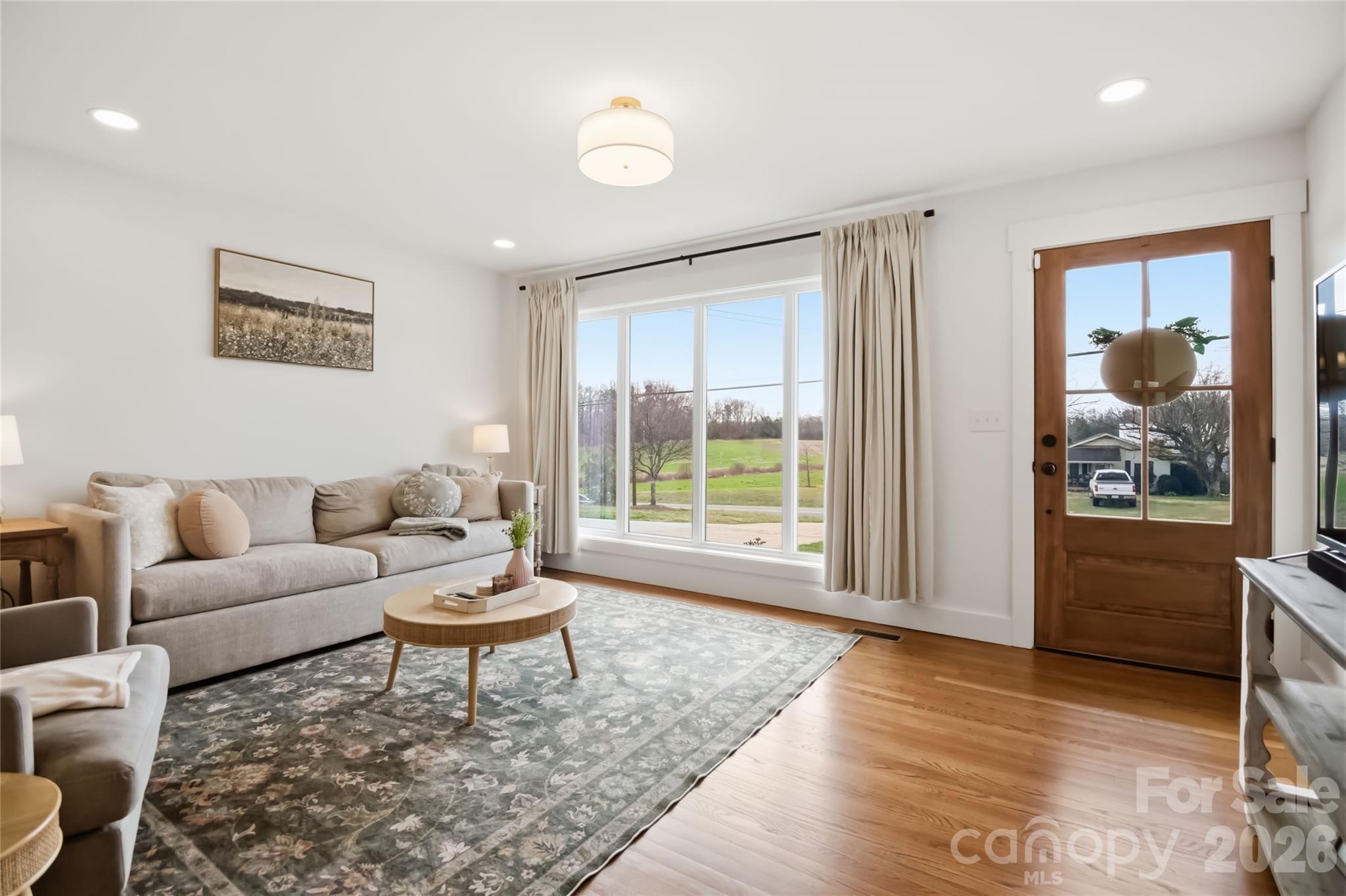 28461 Canton Road Albemarle, NC 28001 - Photo 5 of 30 a living room with furniture and a large window