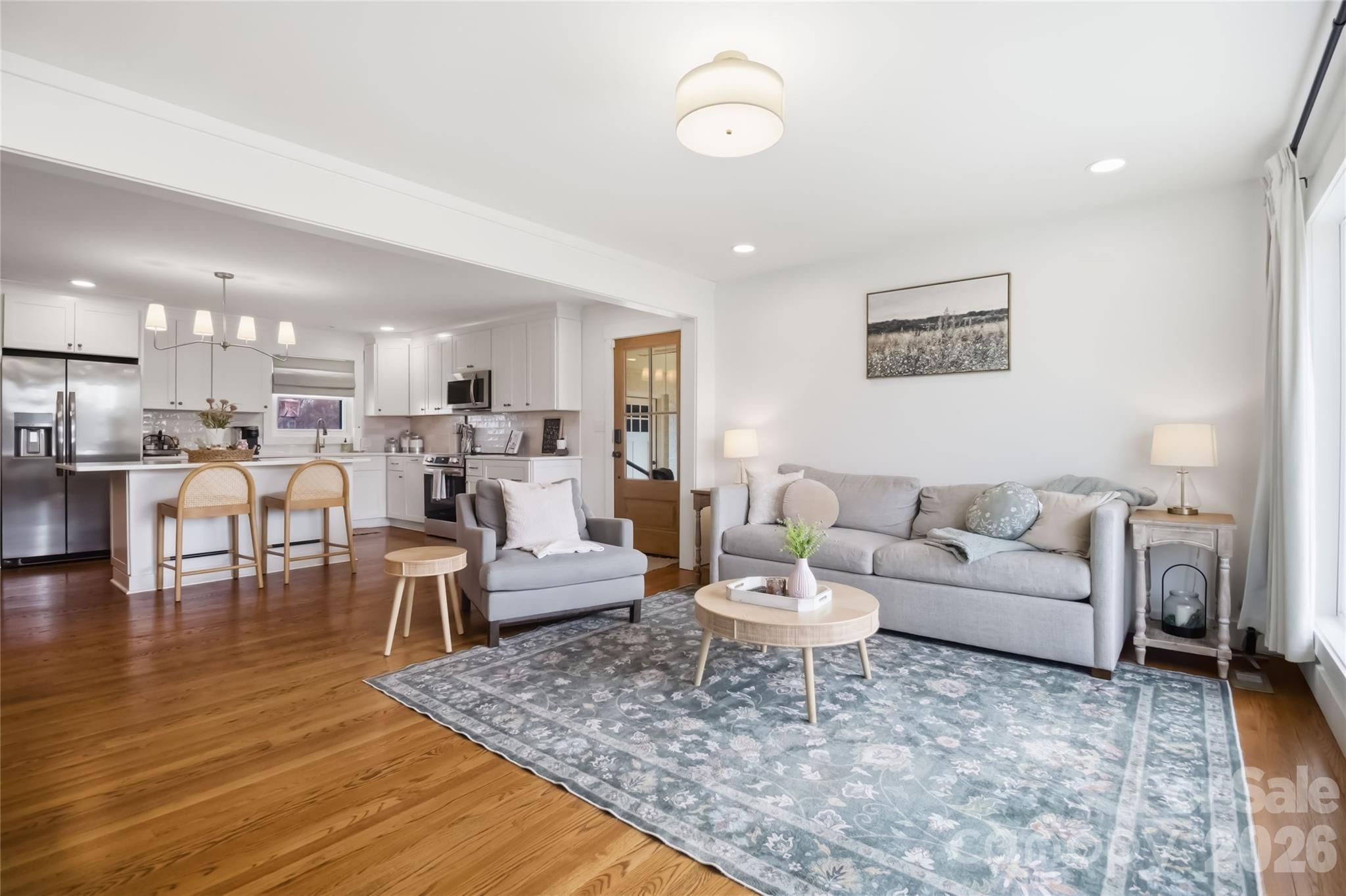 28461 Canton Road Albemarle, NC 28001 - Photo 6 of 30 a living room with lots of furniture and kitchen view