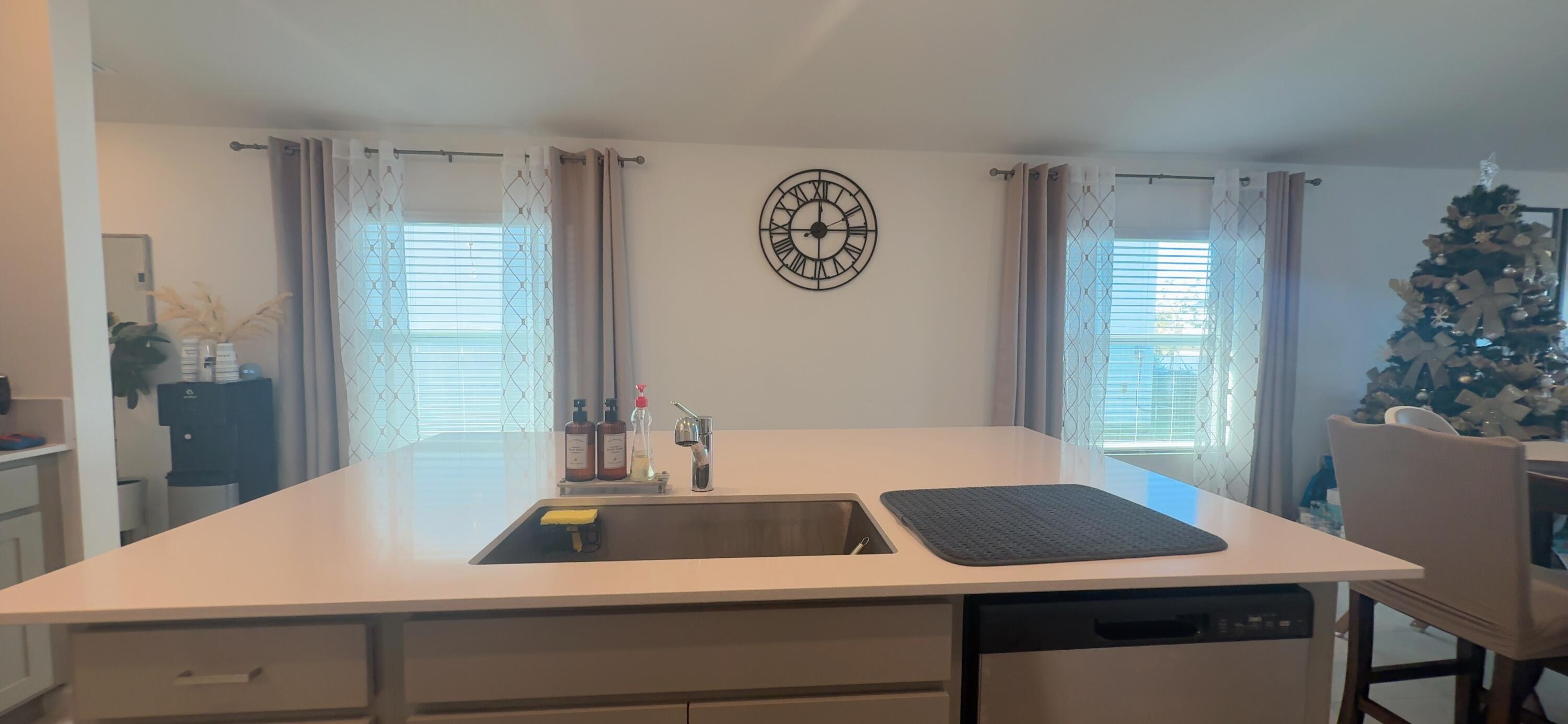 682 Papillon Street Southwest Palm Bay, FL 32908 - Photo 15 of 30 a view of a dining room with furniture and window