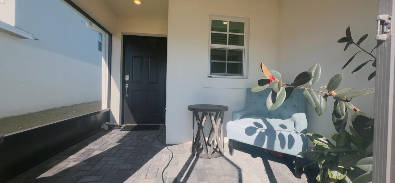 682 Papillon Street Southwest Palm Bay, FL 32908 - Photo 25 of 30 a view of a livingroom with furniture and furniture