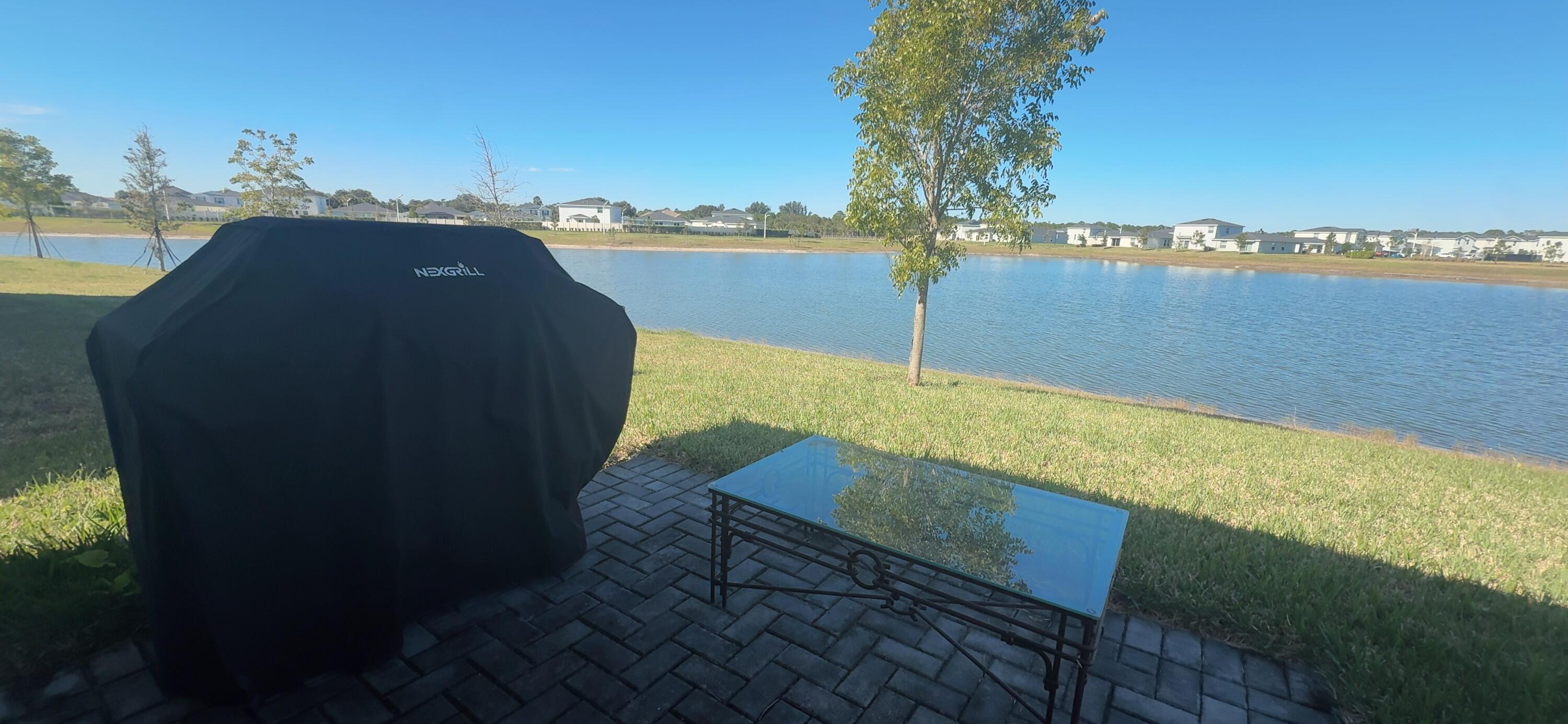 682 Papillon Street Southwest Palm Bay, FL 32908 - Photo 5 of 30 a view of a lake with a city