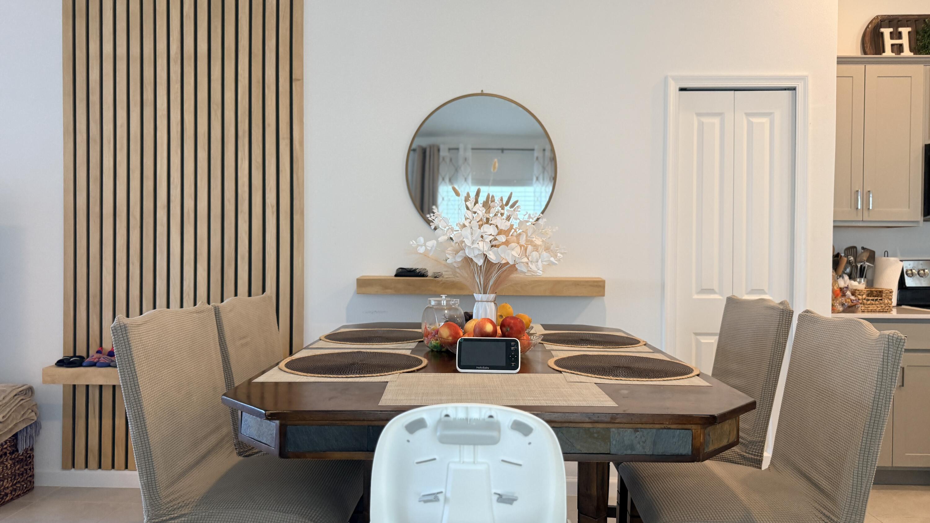 682 Papillon Street Southwest Palm Bay, FL 32908 - Photo 8 of 30 a dining room with furniture and wooden floor