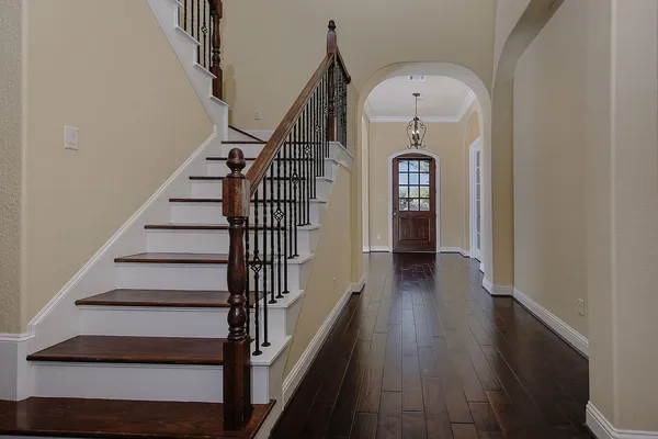 a view of entryway with wooden floor