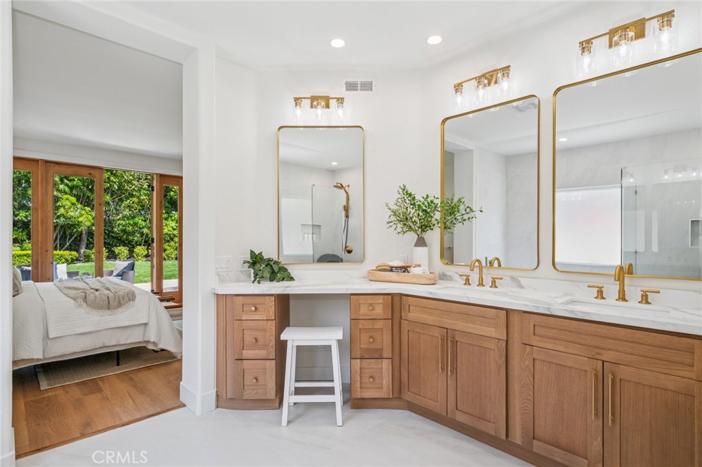 38 San Raphael Dana Point, CA 92629 - Photo 17 of 38 a en suite bathroom with a double vanity sink and a large mirror