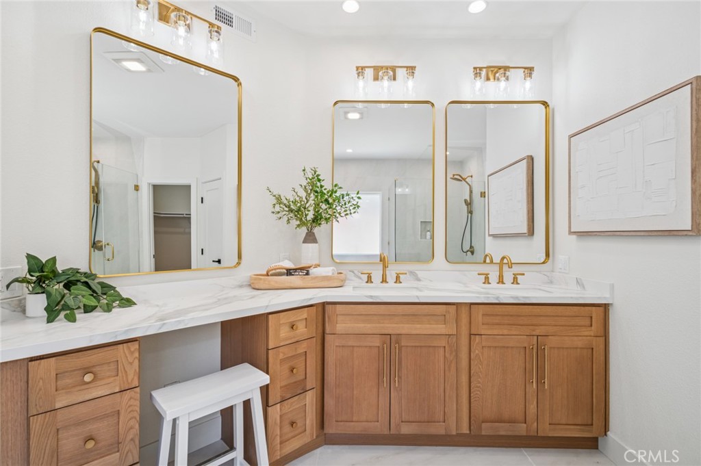 38 San Raphael Dana Point, CA 92629 - Photo 18 of 38 a bathroom with a sink and a mirror