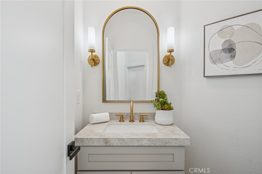 38 San Raphael Dana Point, CA 92629 - Photo 21 of 38 a bathroom with a sink and a mirror