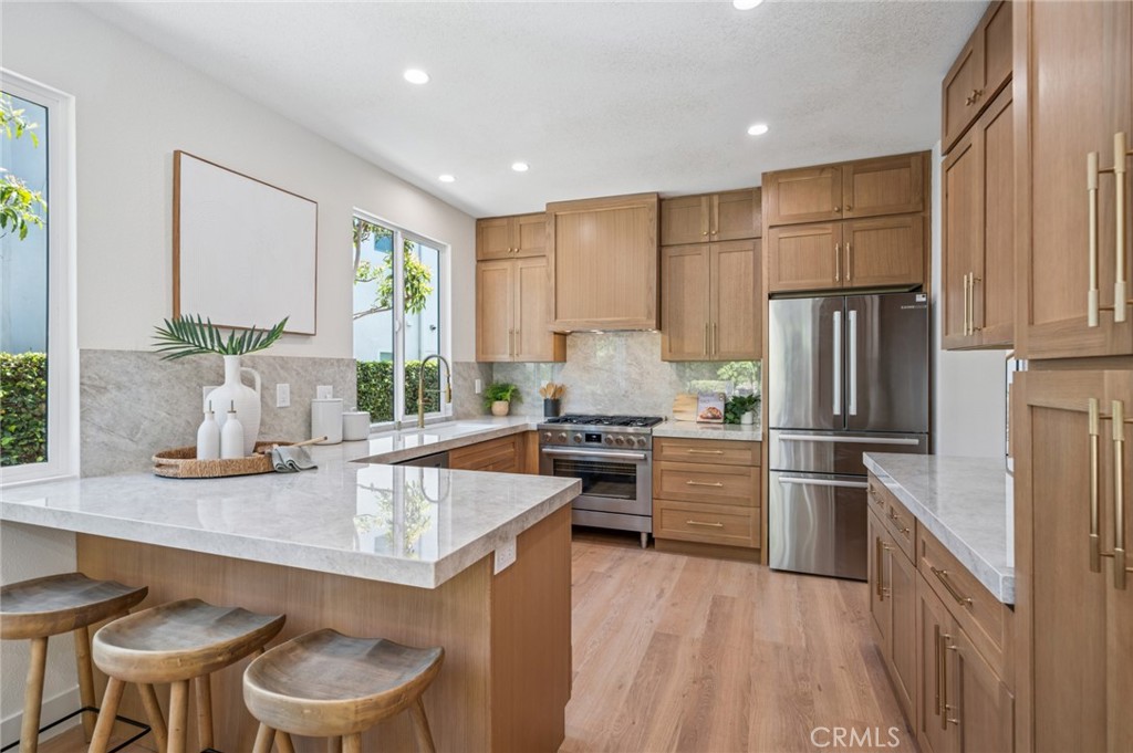 38 San Raphael Dana Point, CA 92629 - Photo 10 of 38 a kitchen with a sink stove and refrigerator