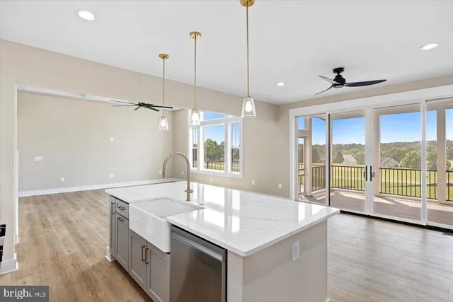 a view of entryway with wooden floor and glass door