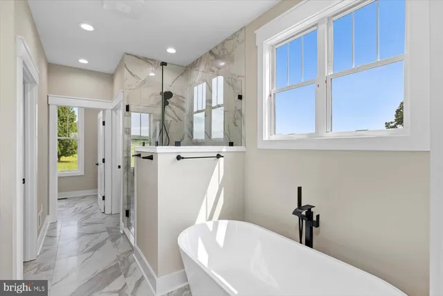 a view of an empty room with glass door