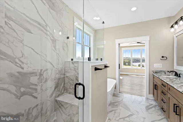 a view of balcony with wooden floor & fence