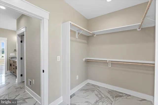 a view of a house with swimming pool and a yard