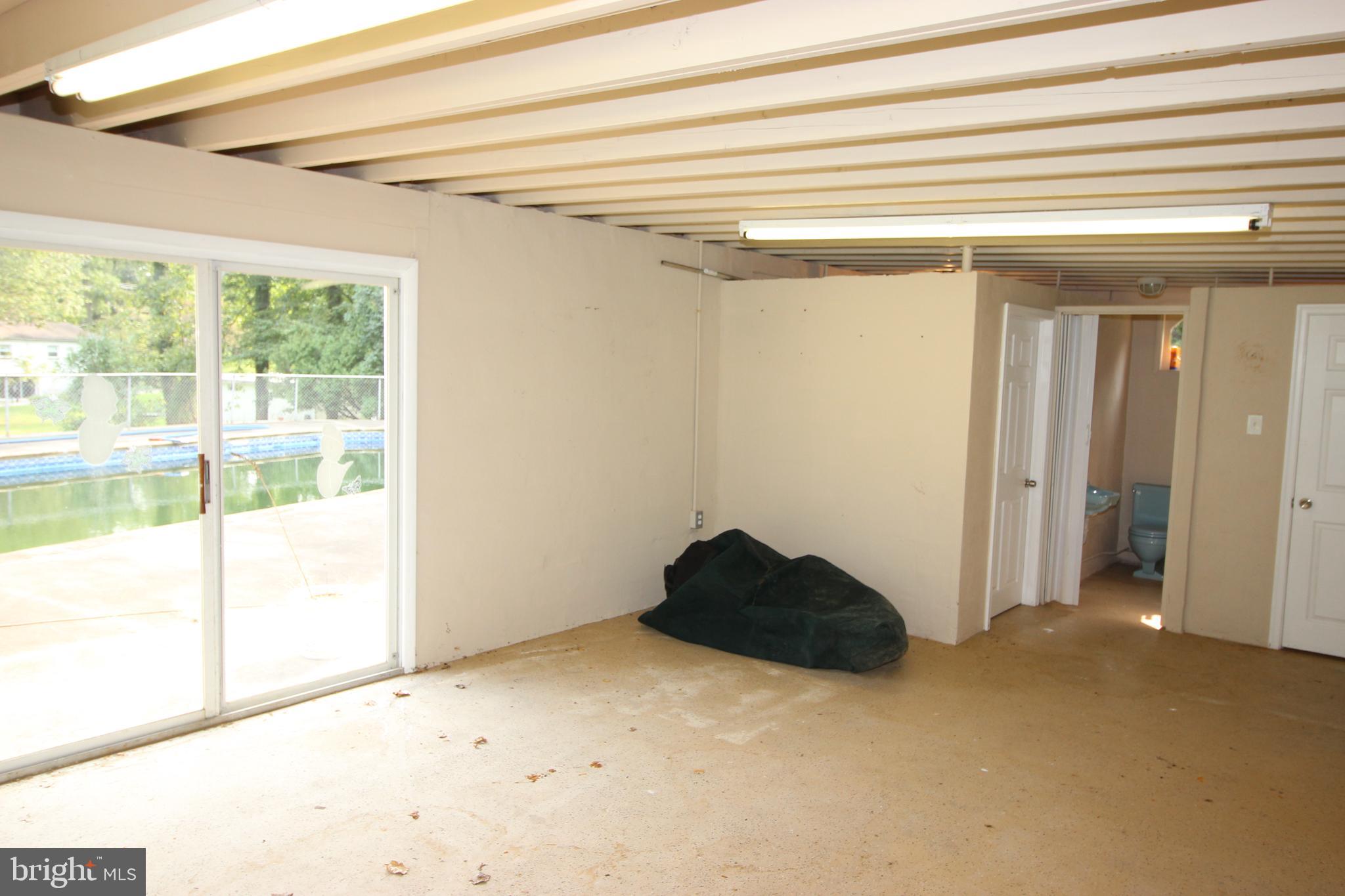 3232 Masons Mill Road Huntingdon Valley, PA 19006 - Photo 14 of 46 Pool house with Changing Rm. 1/2 Bath & Supply Rm