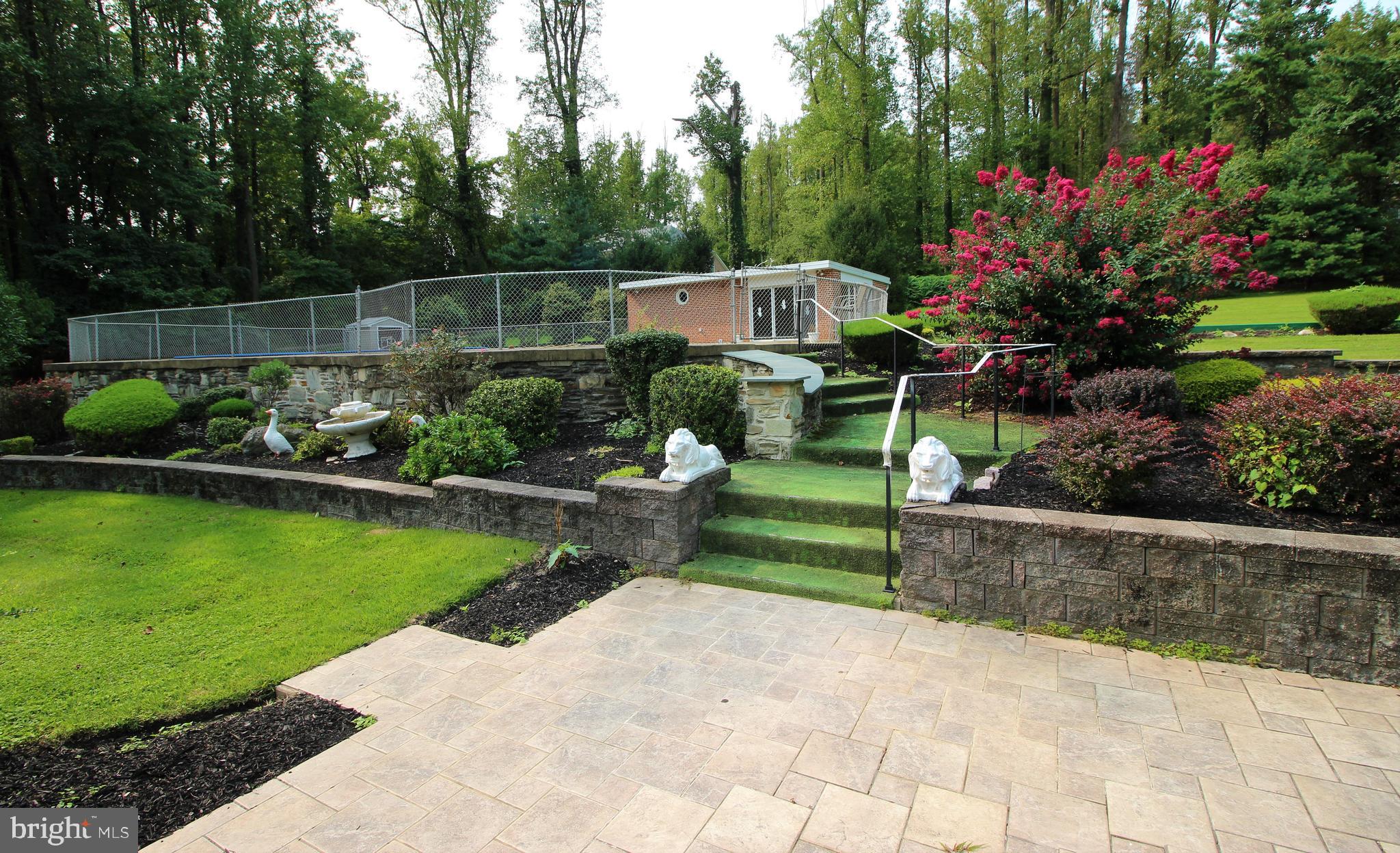 3232 Masons Mill Road Huntingdon Valley, PA 19006 - Photo 8 of 46 Rear Patio to Pool house. Great landscape,