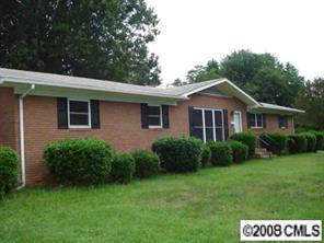 256 Frances Circle Fort Mill, SC 29708 - Photo 1 of 8 a front view of a house with a yard