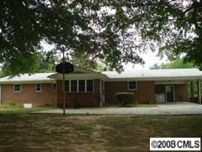 256 Frances Circle Fort Mill, SC 29708 - Photo 8 of 8 a front view of a house with a garden