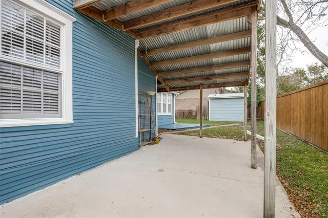 a view of a room with a large window