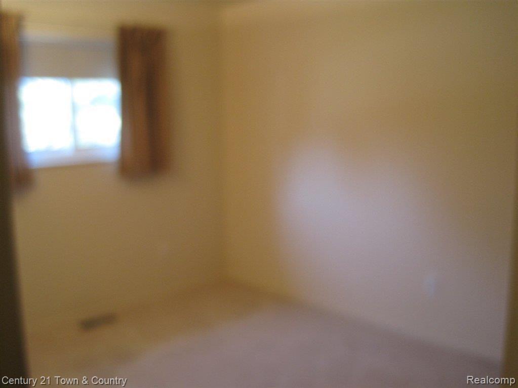 640 Ridge Road Walled Lake, MI 48390 - Photo 15 of 16 Second Bedroom