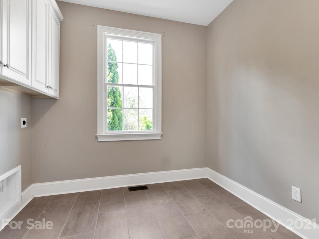 225 Cattle Ridge Road Marvin, NC 28173 - Photo 17 of 42 an empty room with a window