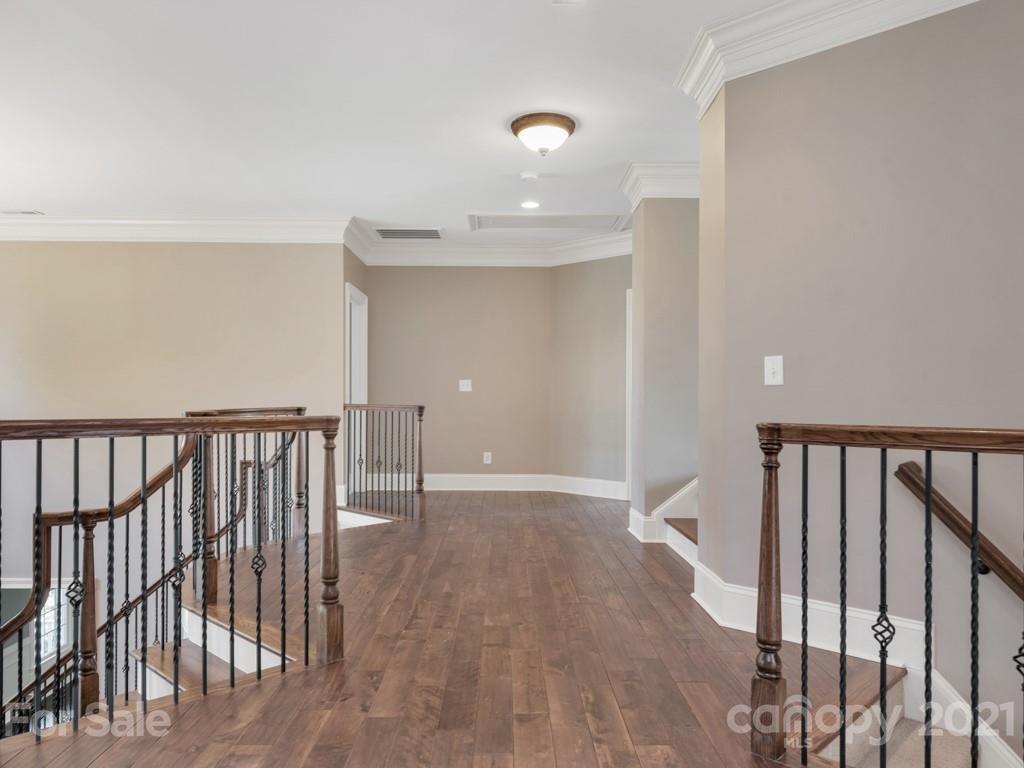 225 Cattle Ridge Road Marvin, NC 28173 - Photo 20 of 42 a view of hallway with wooden floor