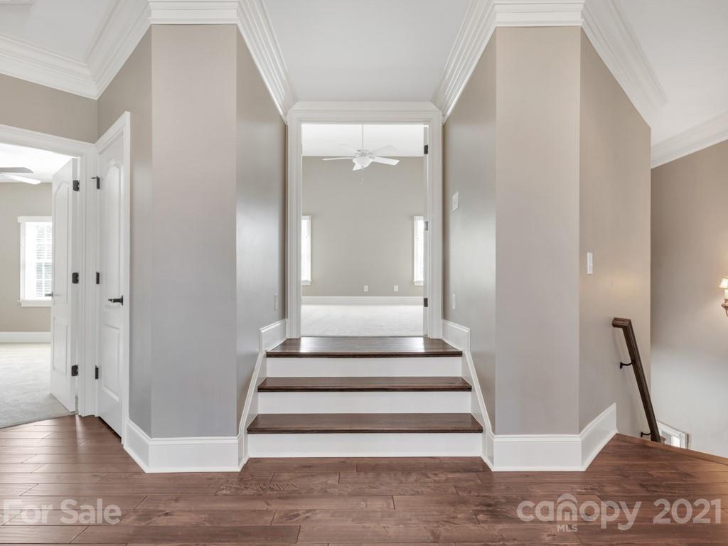 225 Cattle Ridge Road Marvin, NC 28173 - Photo 21 of 42 a view of staircase with white walls