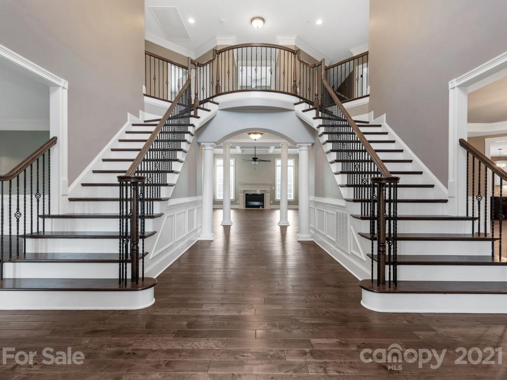 225 Cattle Ridge Road Marvin, NC 28173 - Photo 4 of 42 a view of an entryway with wooden floor and a front door