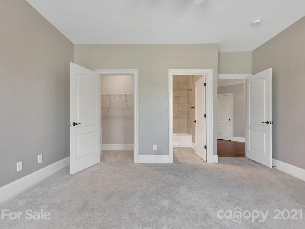 225 Cattle Ridge Road Marvin, NC 28173 - Photo 33 of 42 wooden floor and closet area in bathroom
