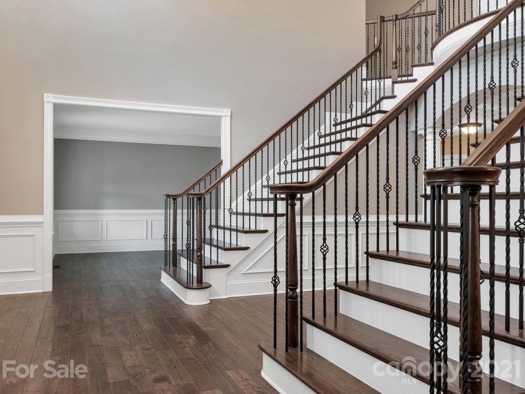225 Cattle Ridge Road Marvin, NC 28173 - Photo 5 of 42 a view of entryway with wooden floor and stairs