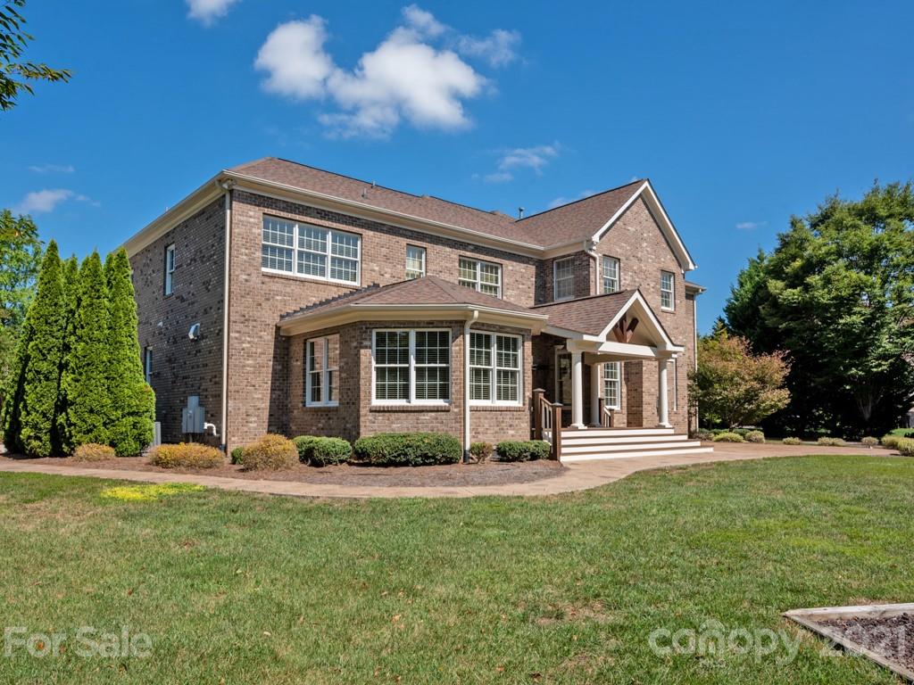 225 Cattle Ridge Road Marvin, NC 28173 - Photo 41 of 42 a front view of a house with a yard