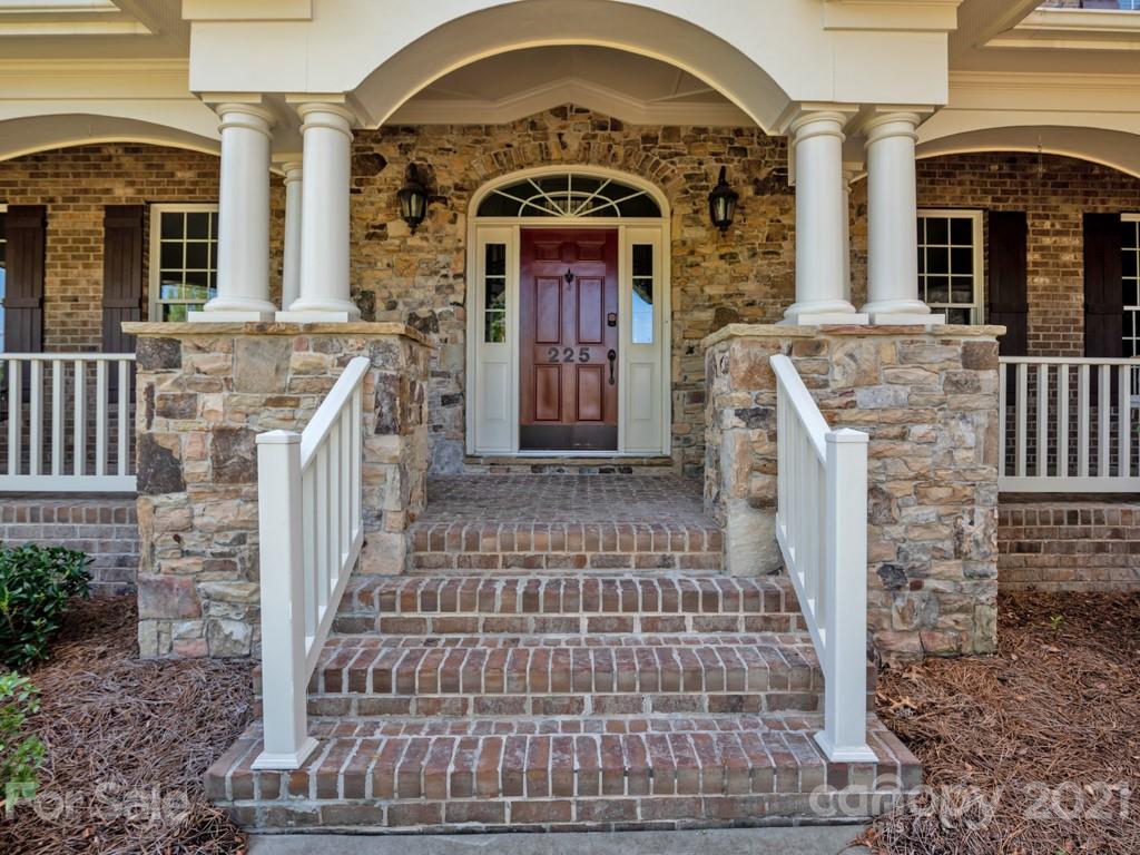 225 Cattle Ridge Road Marvin, NC 28173 - Photo 42 of 42 a front view of a house with large windows