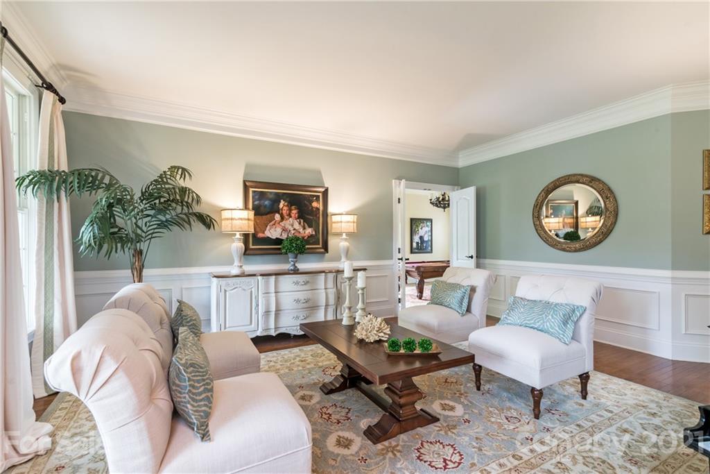 225 Cattle Ridge Road Marvin, NC 28173 - Photo 6 of 42 a living room with furniture and a large window