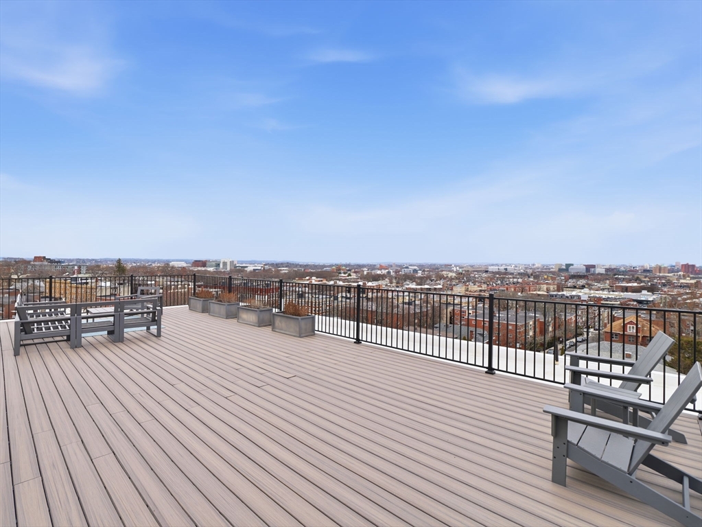 249 Corey Road, Unit 105 Boston, MA 02135 - Photo 24 of 41 a view of roof deck with patio