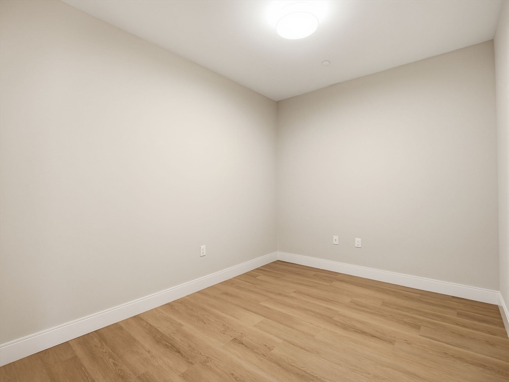 249 Corey Road, Unit 105 Boston, MA 02135 - Photo 7 of 41 a view of an empty room