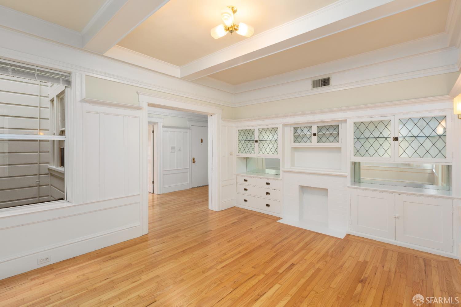 1338 Larkin Street San Francisco, CA 94109 - Photo 18 of 56 a view of empty room with wooden floor and fan