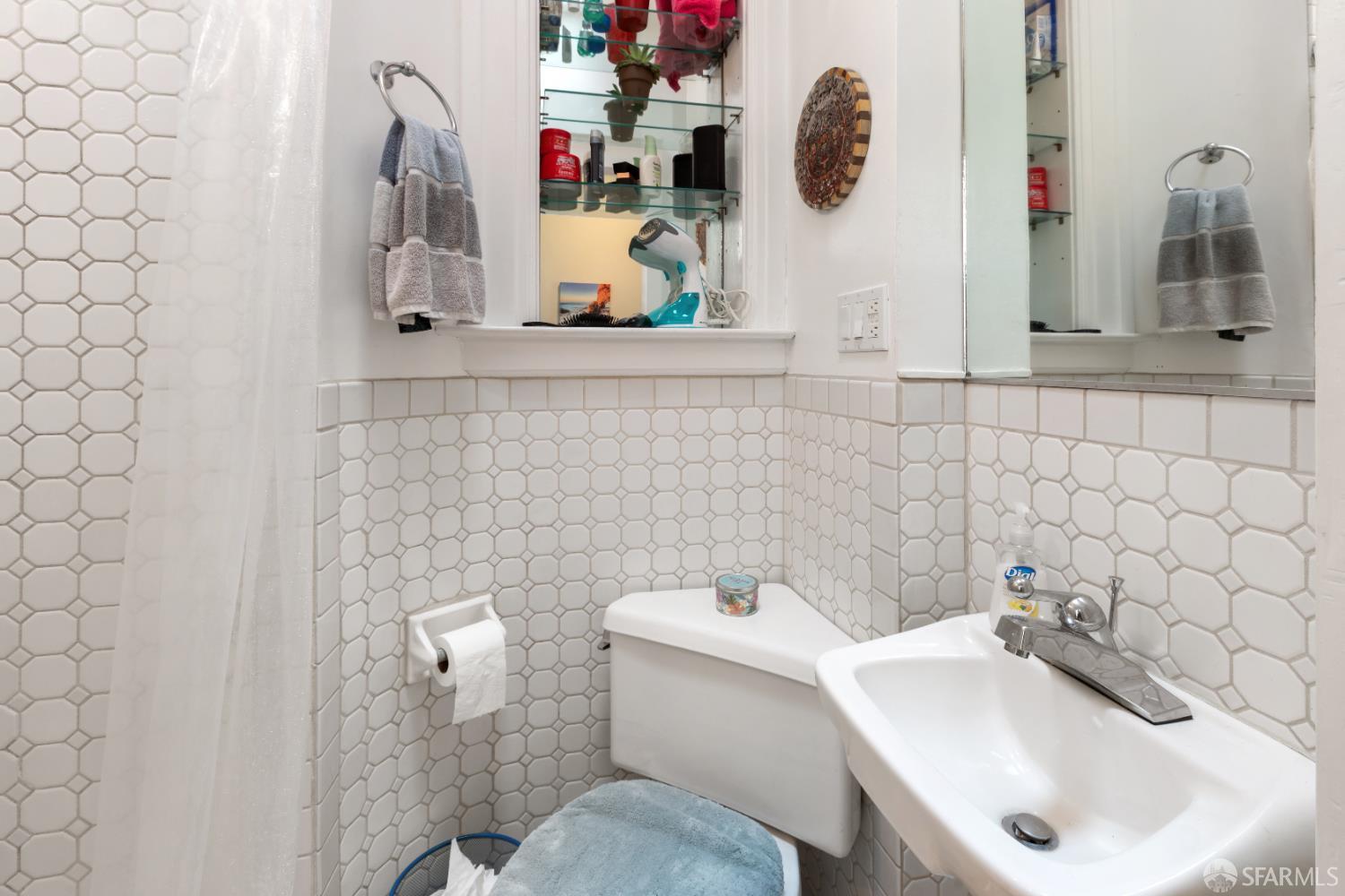 1338 Larkin Street San Francisco, CA 94109 - Photo 39 of 56 a bathroom with a sink and toilet