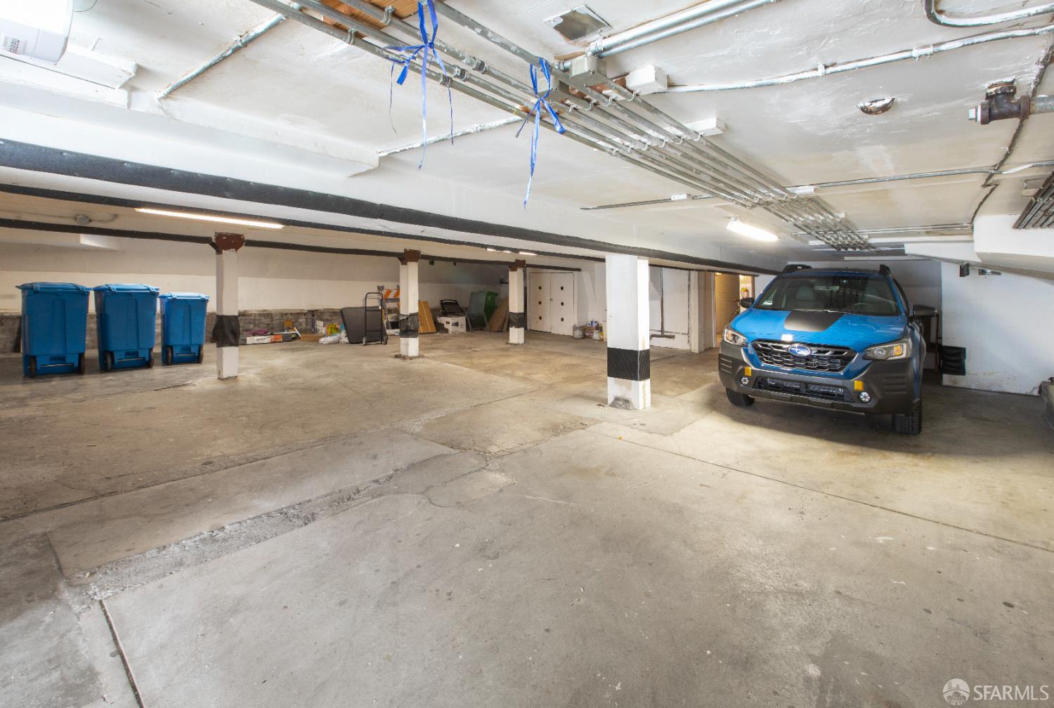 1338 Larkin Street San Francisco, CA 94109 - Photo 4 of 56 a car parked in a parking garage