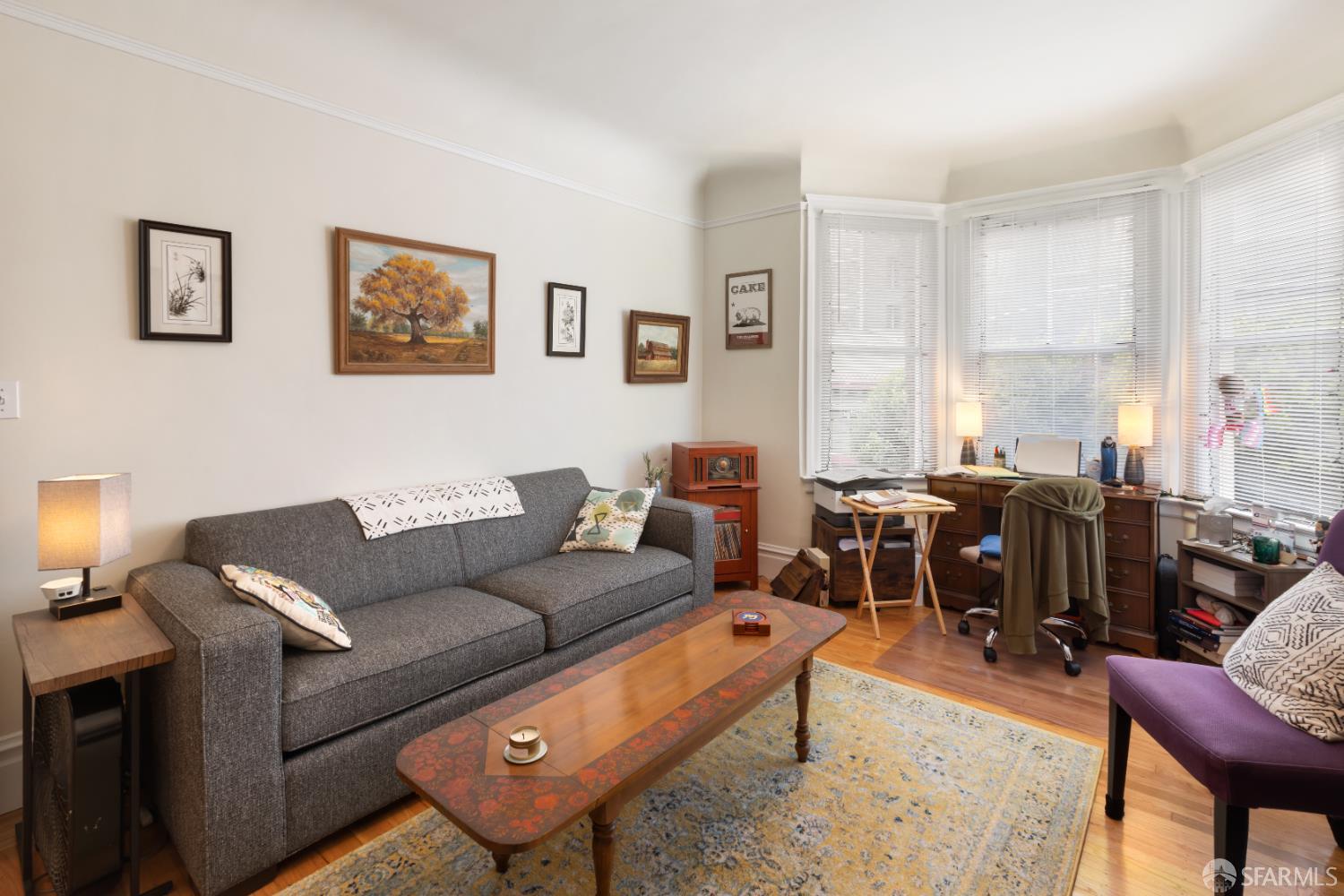 1338 Larkin Street San Francisco, CA 94109 - Photo 55 of 56 a living room with furniture a rug and a window