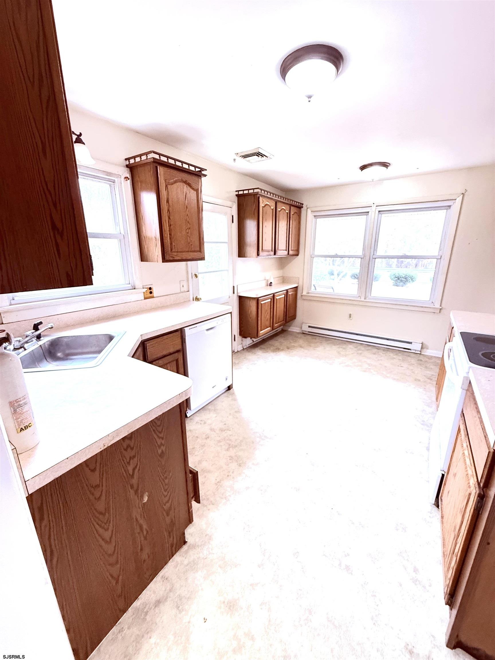 241 Mill Road Woodbine, NJ 08270 - Photo 13 of 31 a spacious bathroom with a tub sink and mirror