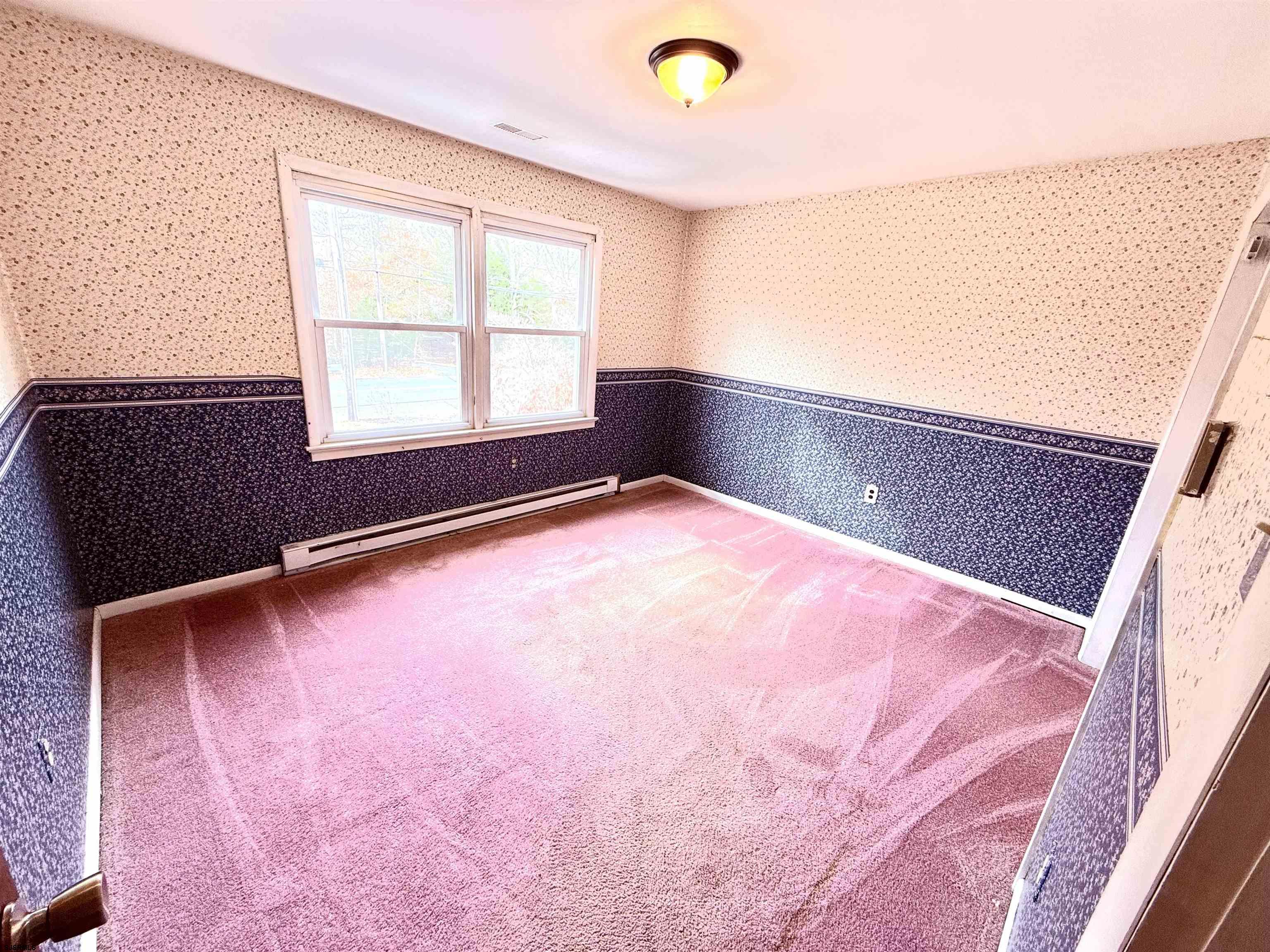 241 Mill Road Woodbine, NJ 08270 - Photo 20 of 31 a view of an empty room with a window