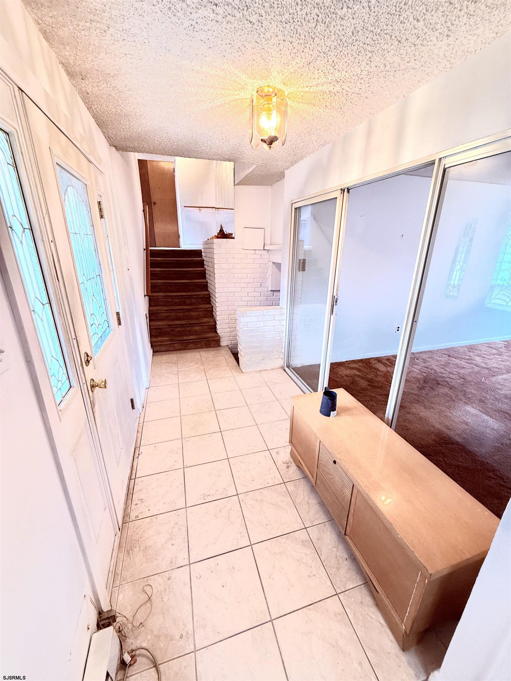 241 Mill Road Woodbine, NJ 08270 - Photo 7 of 31 a view of an entryway with staircase